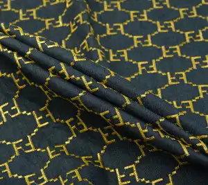 Dżins bawełniany Fendi z haftem złotego logo
