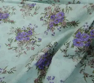 Tweed sygnowany Emanuel Ungaro - kwiaty na miętowym tle 