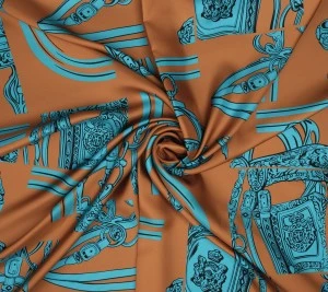 Jedwab twill 100%  - ornamenty na cynamonowym tle