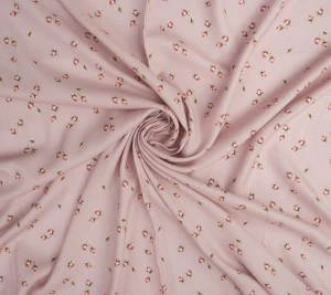 Wiskoza o splocie krepowym - różyczki i na różowym tle