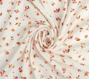 Wiskoza o splocie krepowym - różyczki i na różowym tle